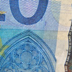 Currency closeup guilloche patterns