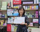 Daesung C&C Co., Ltd. Company VP, Ju-Hui Lee, with their SONORA Green Leaf Certificate