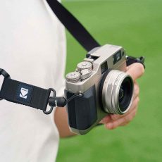 Kodak camera strap grass background