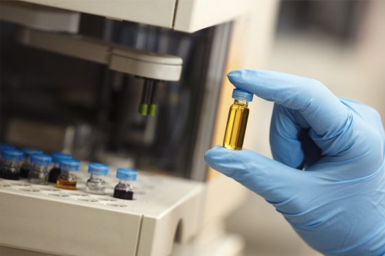 Specialty chemicals worker chemical vial